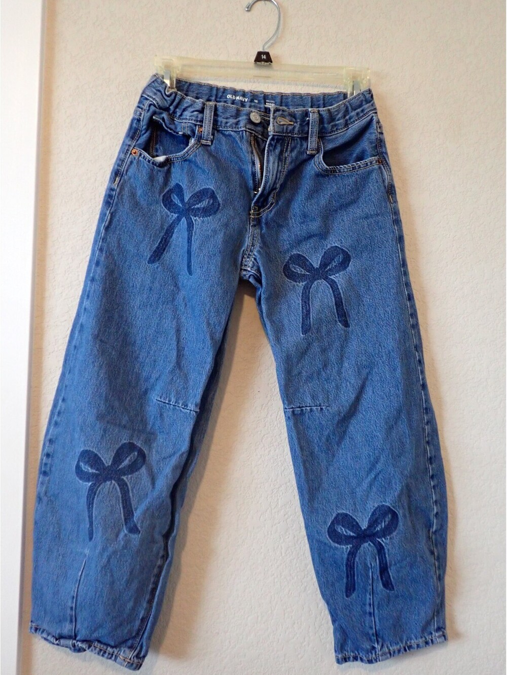 Kids Old Navy bow print baggy ankle jeans